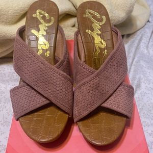 Blush pink color. New, never worn wedges. Size 8.